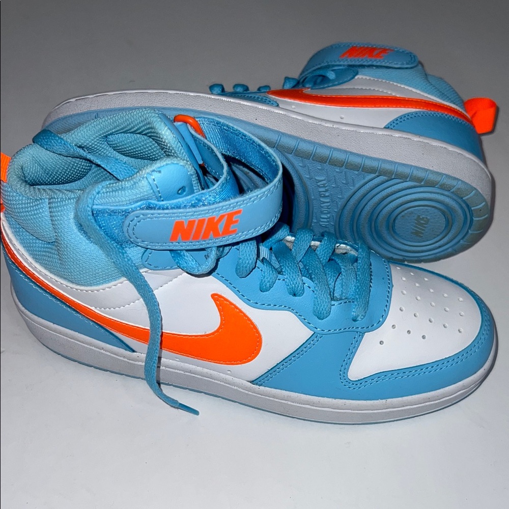 Nike Kids Court Borough Mid 2’s Sneakers in Light Blue, White and Bright Orange